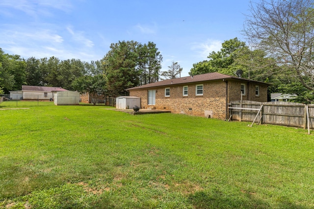  - view of yard with a storage shed