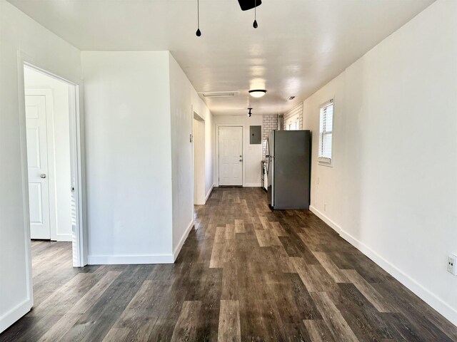 hallway featuring dark hardwood / wood-style flooring