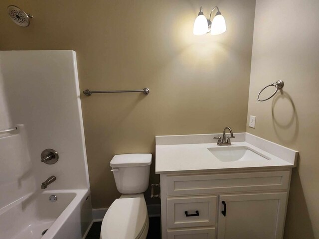 full bathroom featuring vanity, toilet, and shower / bathtub combination