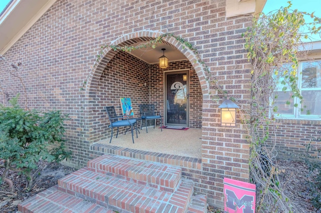 doorway to property featuring a patio