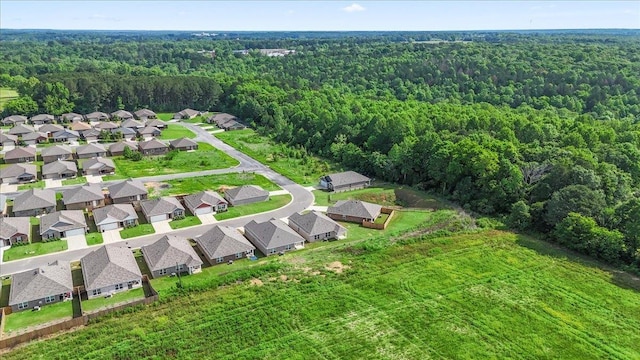  - aerial perspective of suburban area featuring a heavily wooded area
