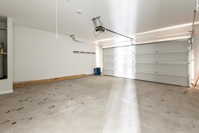  - garage featuring a garage door opener
