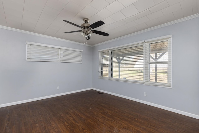 unfurnished room with baseboards, wood finished floors, ceiling fan, and ornamental molding