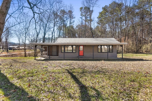 view of front of house featuring covered porch and metal roof