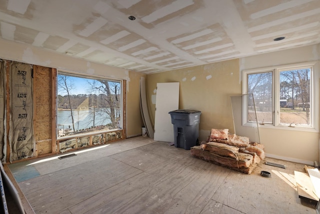 interior space featuring plenty of natural light and visible vents