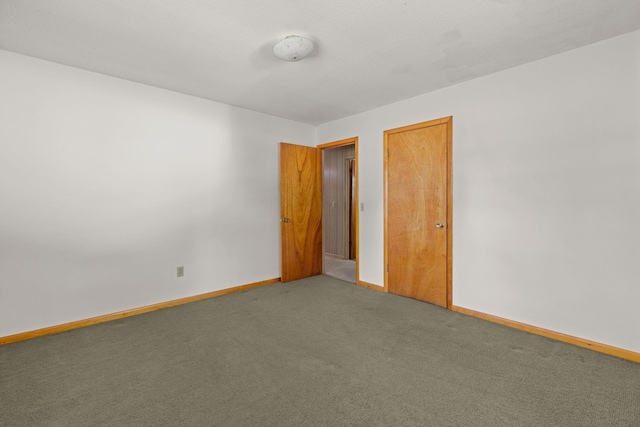 empty room with carpet floors