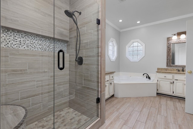 bathroom with shower with separate bathtub, vanity, and crown molding