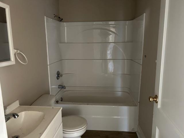 full bathroom with shower / washtub combination, vanity, and toilet