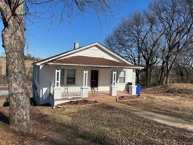 bungalow-style house with a porch