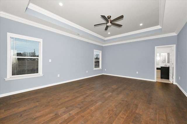 unfurnished room featuring ceiling fan, crown molding, and a tray ceiling