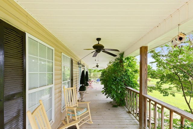  - wooden porch with a ceiling fan