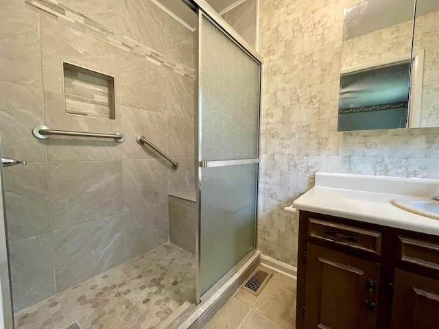  - full bathroom featuring vanity and a stall shower