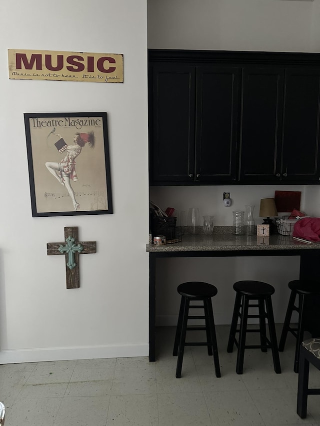 kitchen featuring a breakfast bar area