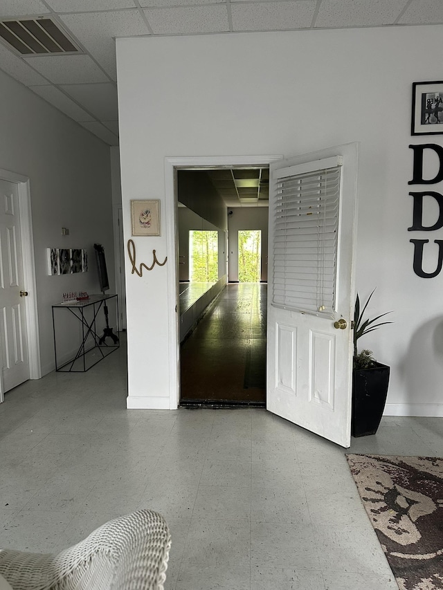 entryway featuring a drop ceiling