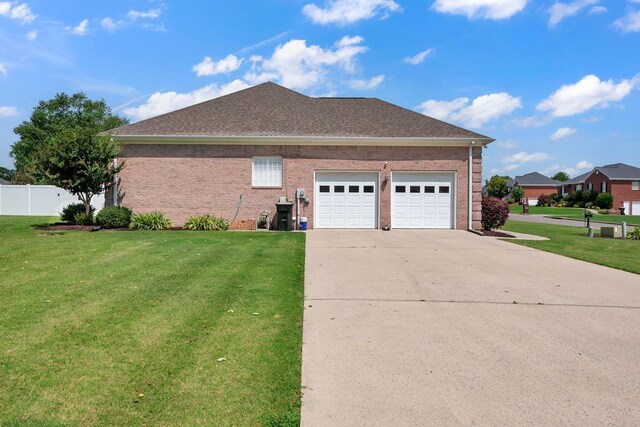  - view of property exterior with driveway, a garage, brick siding, and roof with shingles