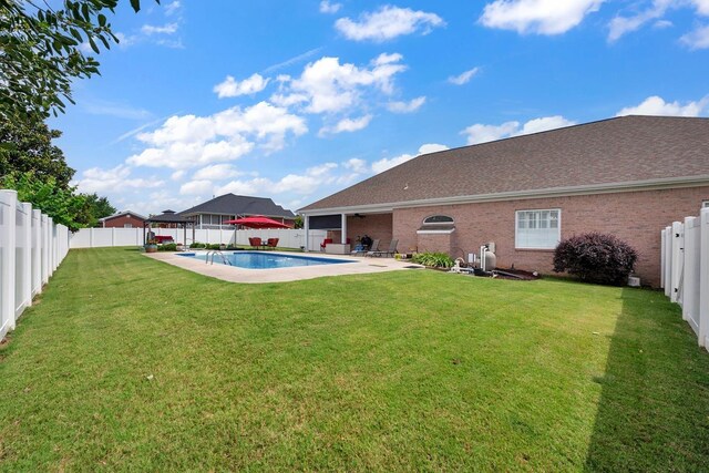  - fenced backyard featuring a gazebo and a patio