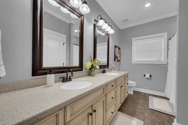  - full bathroom featuring double vanity, crown molding, and tile patterned flooring