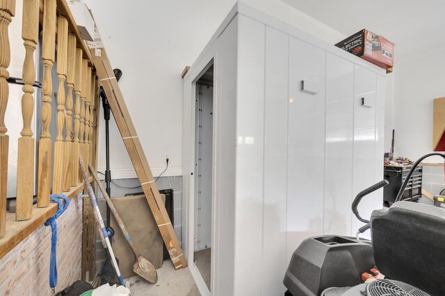  - hall with concrete flooring