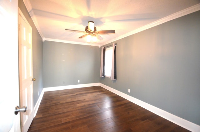 empty room featuring dark wood-type flooring, ceiling fan, and ornamental molding