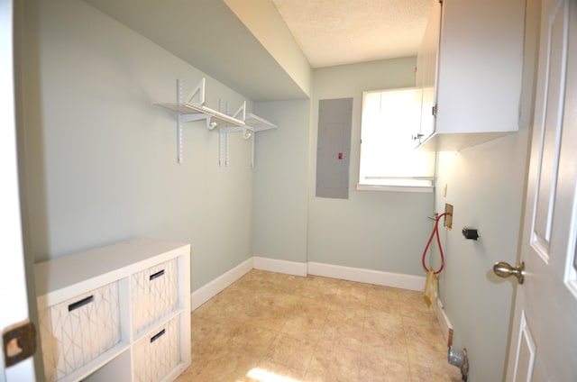 laundry area featuring electric panel