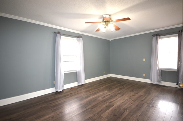 spare room featuring ceiling fan, ornamental molding, dark hardwood / wood-style flooring, and a textured ceiling