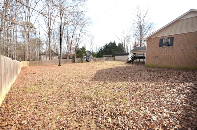 view of yard with a playground