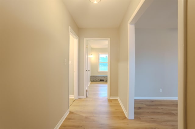 hall featuring light hardwood / wood-style floors