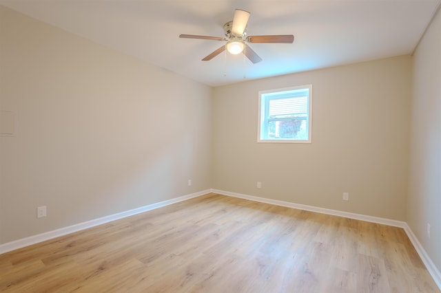 unfurnished room with ceiling fan and light hardwood / wood-style flooring