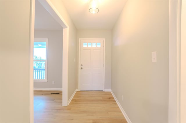 entryway with light hardwood / wood-style floors