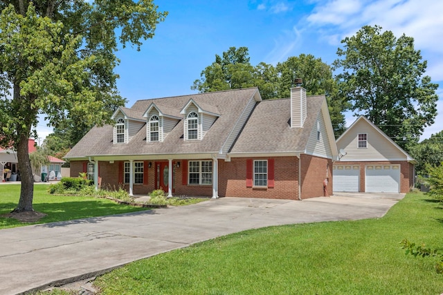 cape cod-style house with a garage, covered porch, and a front yard