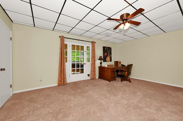 office space with carpet and ceiling fan