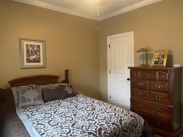 bedroom with ornamental molding