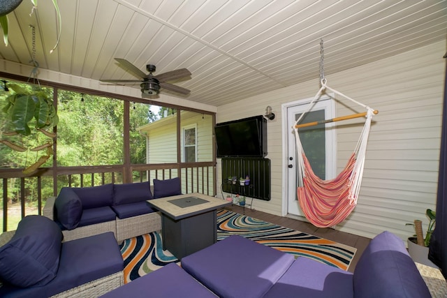  - wooden deck featuring an outdoor living space and ceiling fan