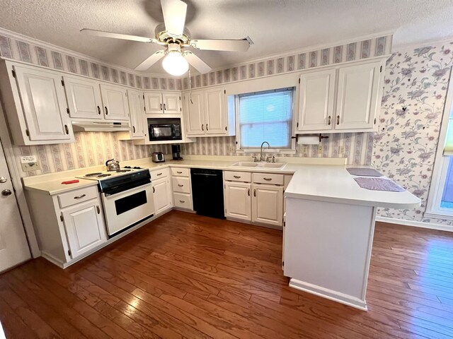 kitchen with white cabinetry, sink, kitchen peninsula, a textured ceiling, and black appliances