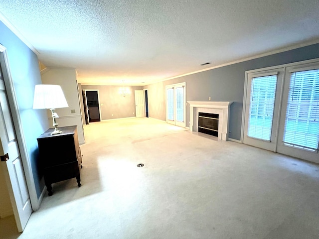 carpeted living room with crown molding and a textured ceiling