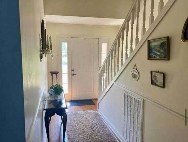 foyer with hardwood / wood-style flooring