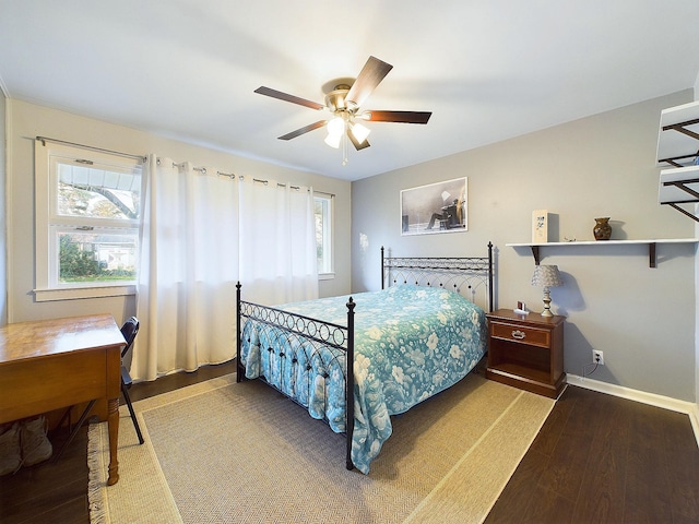 bedroom featuring hardwood / wood-style flooring and ceiling fan