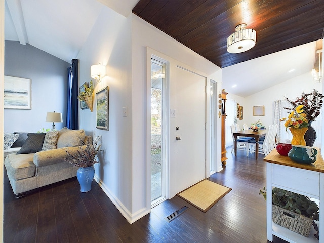 entryway featuring dark hardwood / wood-style floors, lofted ceiling, and wooden ceiling