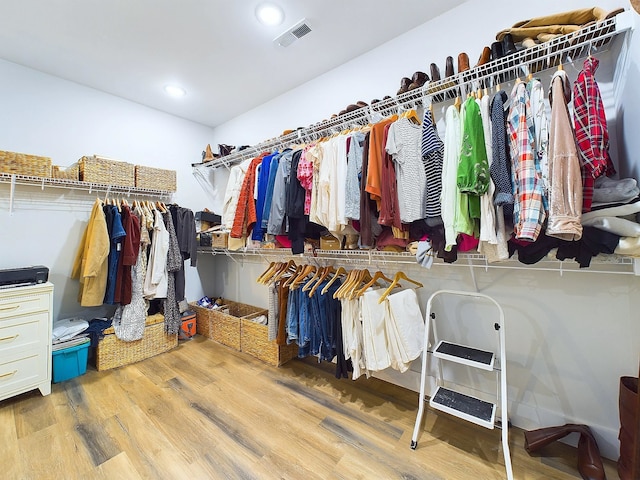 walk in closet featuring light wood-type flooring