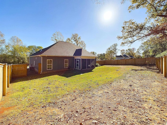 view of yard featuring a sunroom