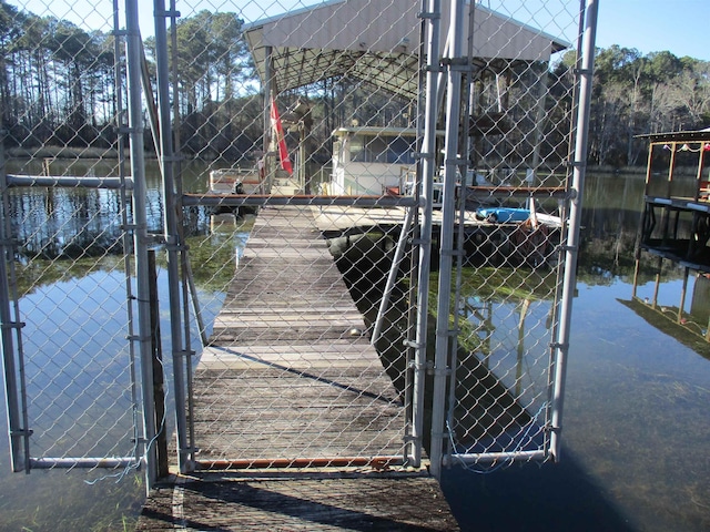 view of dock with a water view