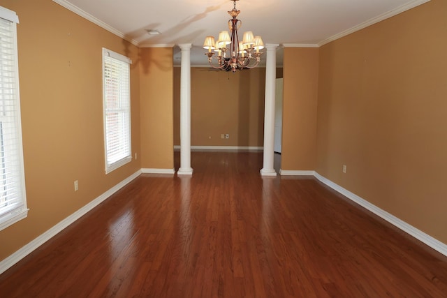 unfurnished dining area featuring decorative columns, baseboards, dark wood-type flooring, and crown molding