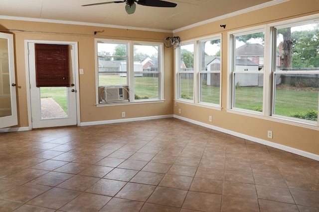 unfurnished sunroom featuring ceiling fan and cooling unit