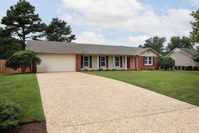 single story home with a garage and a front yard