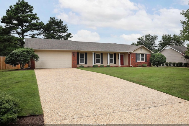 ranch-style home featuring brick siding, an attached garage, a front yard, fence, and driveway