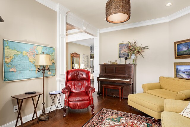 - living area with hardwood / wood-style flooring, ornamental molding, and recessed lighting