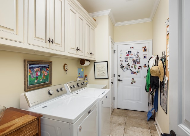  - laundry area featuring independent washer and dryer, crown molding, cabinet space, and light tile patterned floors