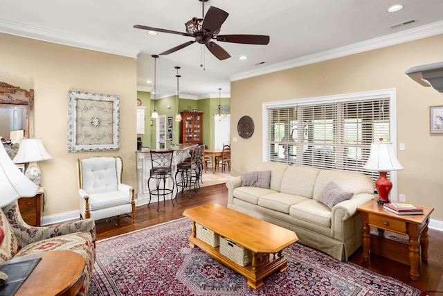  - living room featuring a ceiling fan, wood finished floors, ornamental molding, and recessed lighting