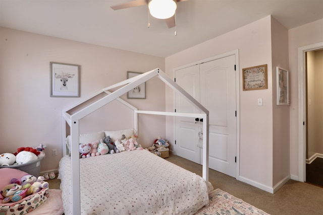 bedroom featuring a closet, carpet, a ceiling fan, and baseboards