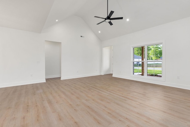 unfurnished living room featuring high vaulted ceiling, light wood-type flooring, a ceiling fan, baseboards, and recessed lighting